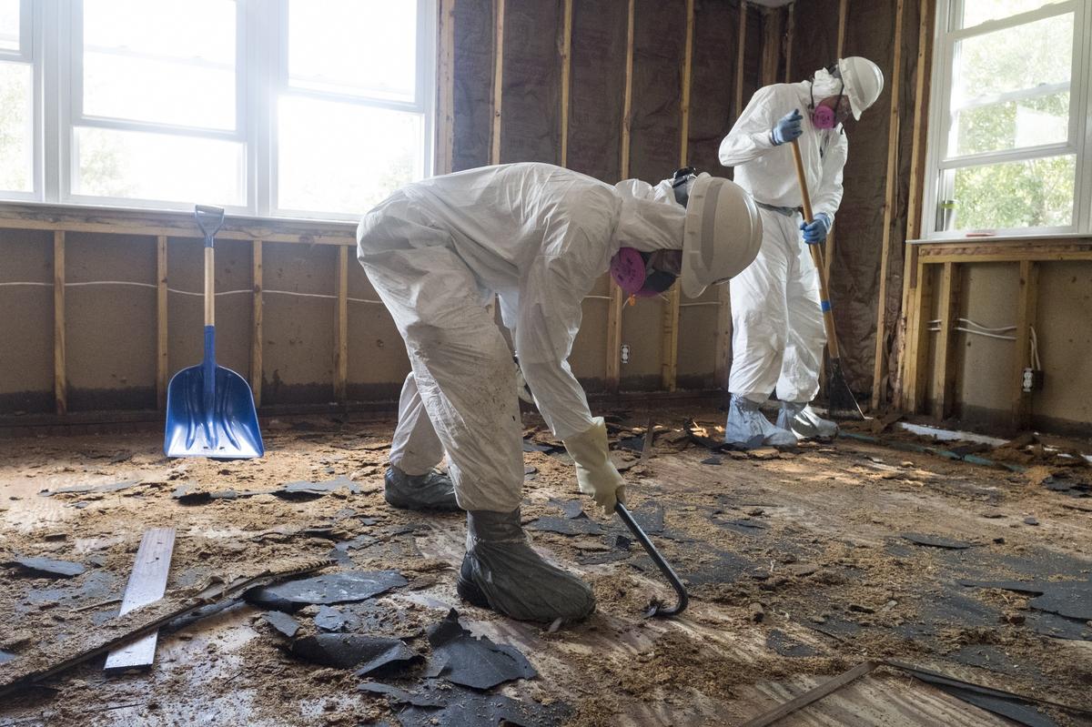 Americorps volunteers from across the United States assist in mucking out the home of Joey Tyler on Sherwood Drive on Monday.The many volunteers that are helping with flood victims are organized under the Waccamaw VOAD (Voluntary Organizations Active in Disasters.) October 1 2018.