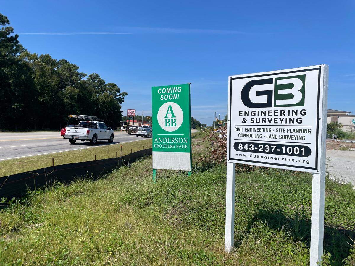A sign announcing the new location of an Anderson Brothers Bank in Carolina Forest. The new business is part of a wave of projects coming to the growing area.