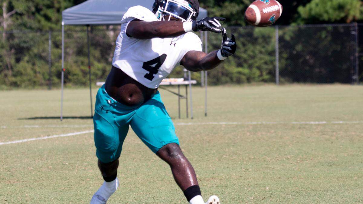 Coastal’s running back C.J. Beasley reaches for a pass in practice. The Coastal Carolina football team have been practicing for their first game of the 2023 season against UCLA in Pasadena, Calif.
