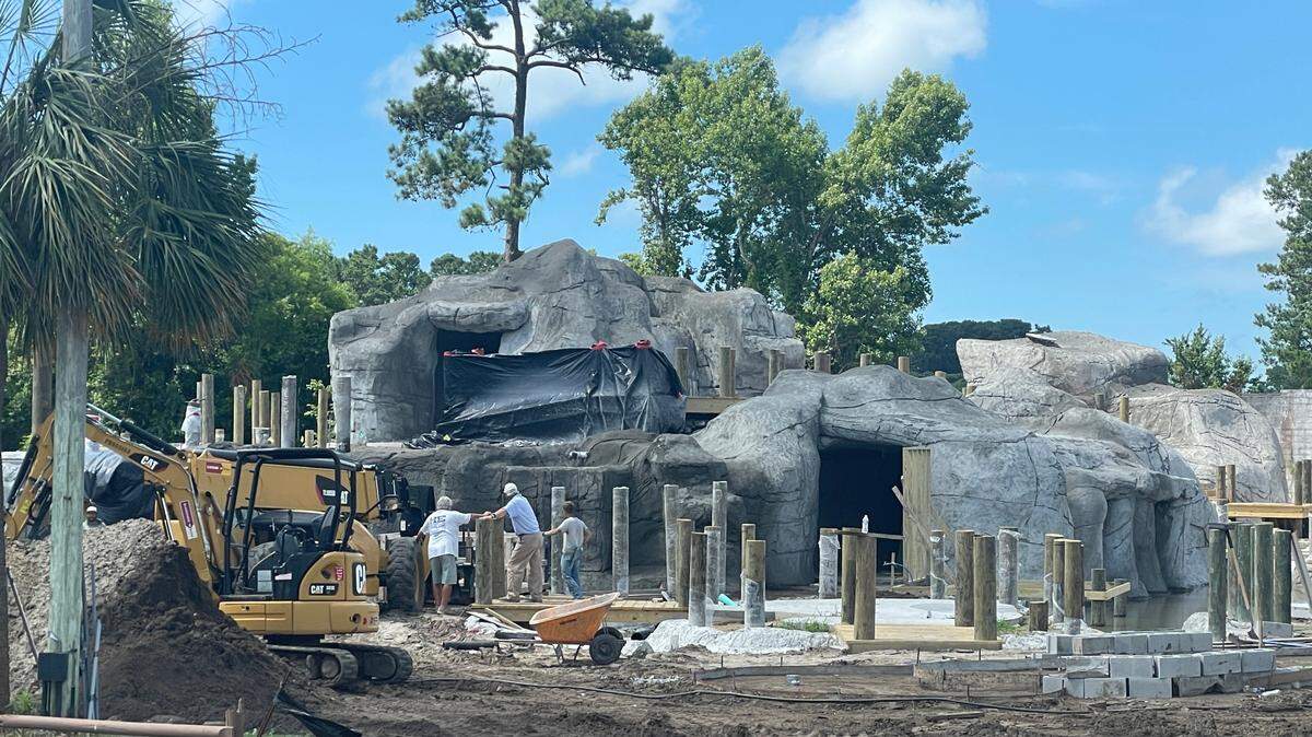 Construction workers perform site work on Adventure Falls Golf putt-putt course in Surfside Beach, SC. The mini golf course originally closed in September 2024.