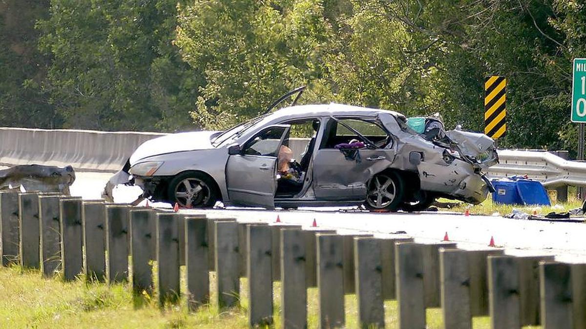 A crumpled Honda, a debris field of clothes and a mangled guard rail are left on S.C. 22 on Tuesday, May 16, 2017. The state highway patrol reported the accident happened around 2:20 p.m. at mile marker 10.