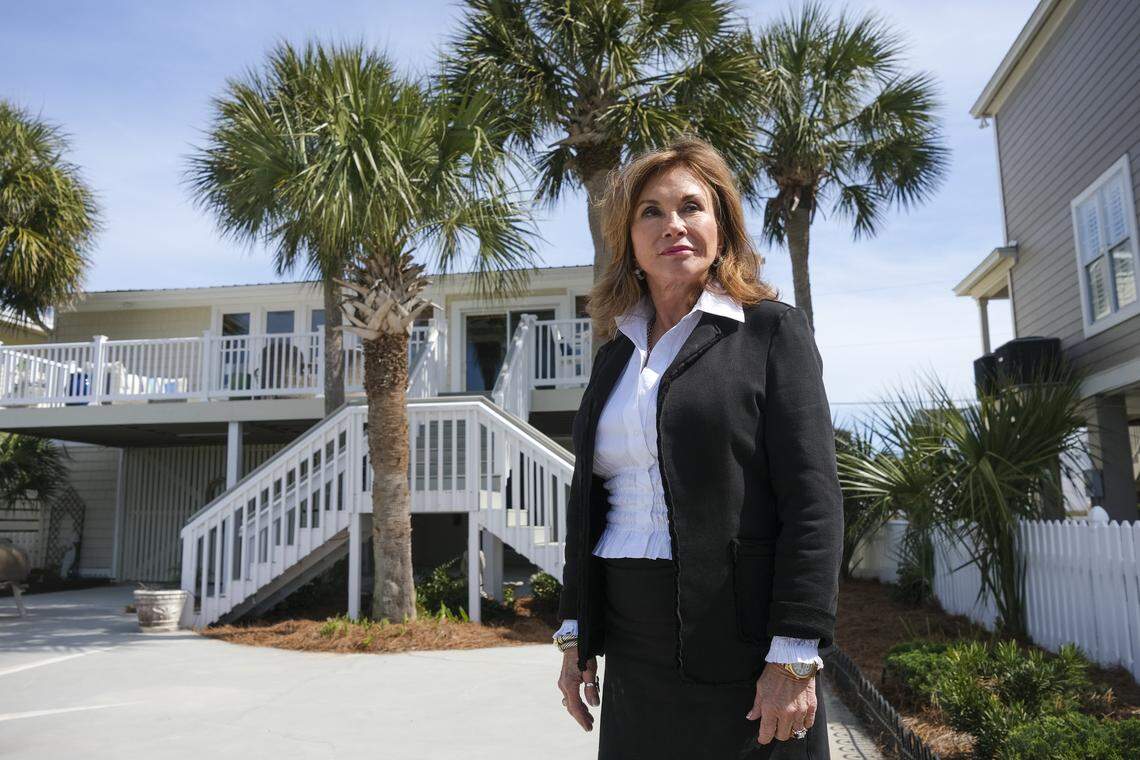 Mary Etta Williams looks out over the Murrells Inlet marsh from her home in Garden City, S.C. Williams has remodeled the lower portion of her home with waterproof materials to make it more resistant to the flooding that she says is happening more frequently in recent years. March 22, 2026.