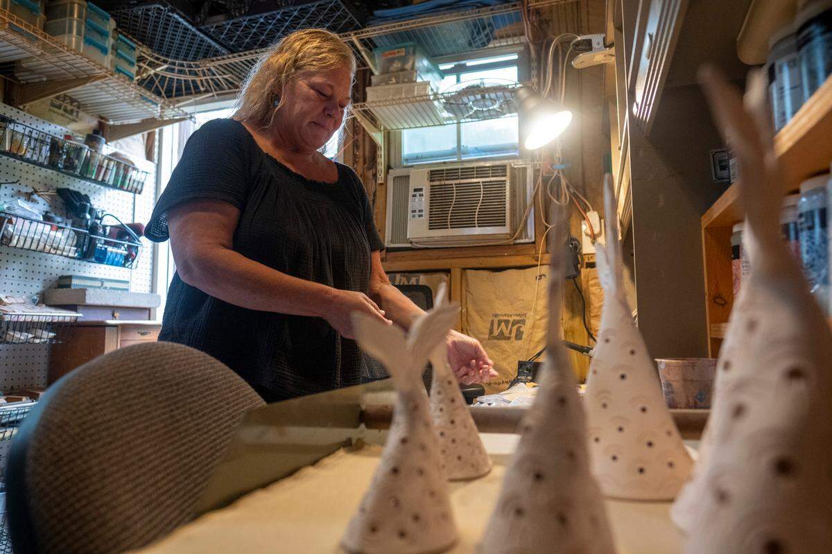 Pawley’s Island artist Christina Bowman Roberts crafts pottery and wood burnings taking cues from the local environment. Her recent work includes pottery Christmas trees, mermaid tail trees and shell ornaments. The artist’s work is sold at Sand + Sea Beach Co. in Litchfield Beach, S.C., S.C. September, 21, 2023.