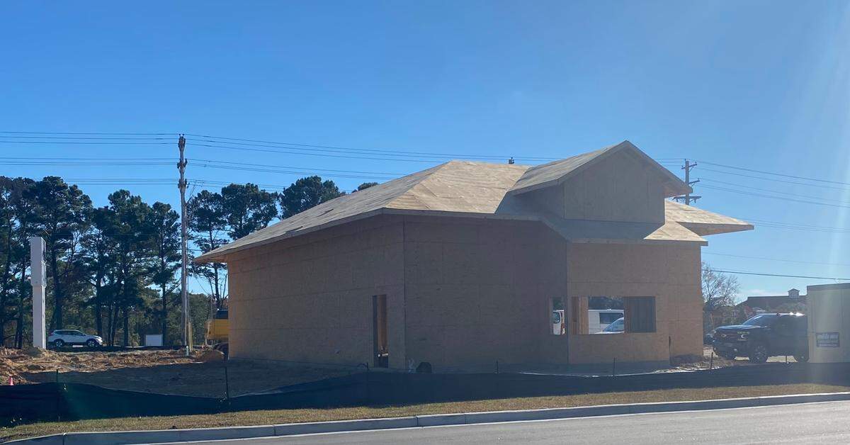 Construction crews were on the site of a new Starbucks drive-thru in Little River. The coffee shop will open sometime next year.