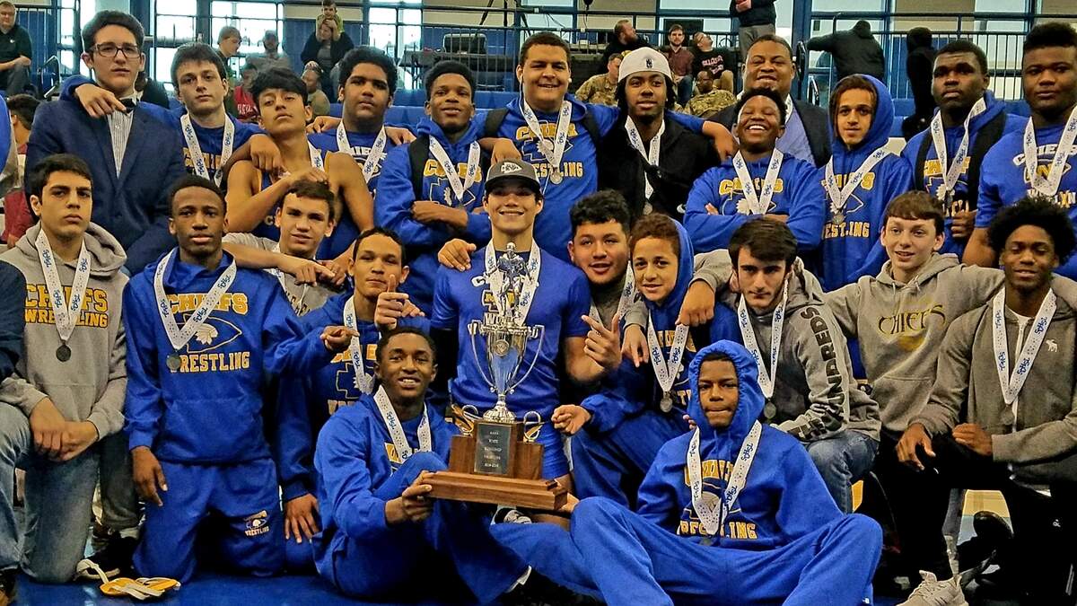 North Myrtle Beach wrestling team poses with the runner-up trophy after losing to Eastside in the Class 4A championship Saturday at Airport High School.