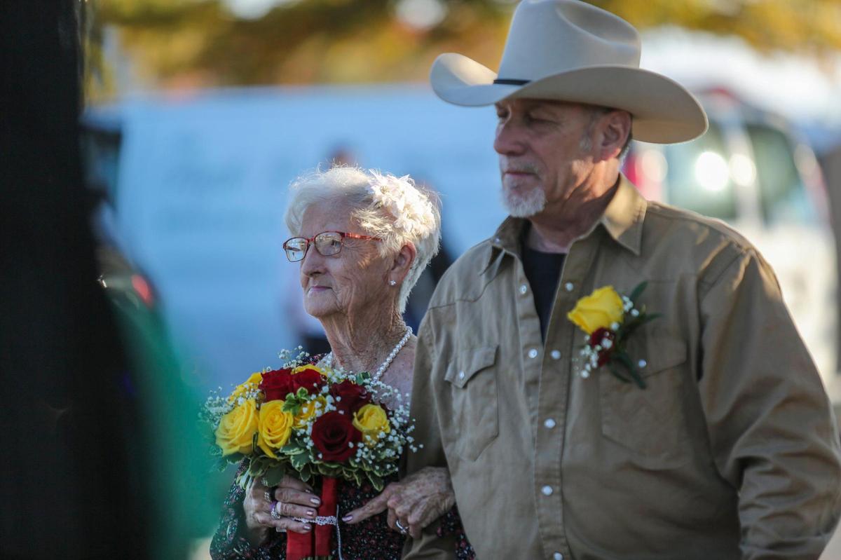 Jane Billedeaux and Harris Putnam, both 82-years-old, married Saturday in the parking lot of the Walmart where Billedeaux works as a host. Nov. 13, 2021.