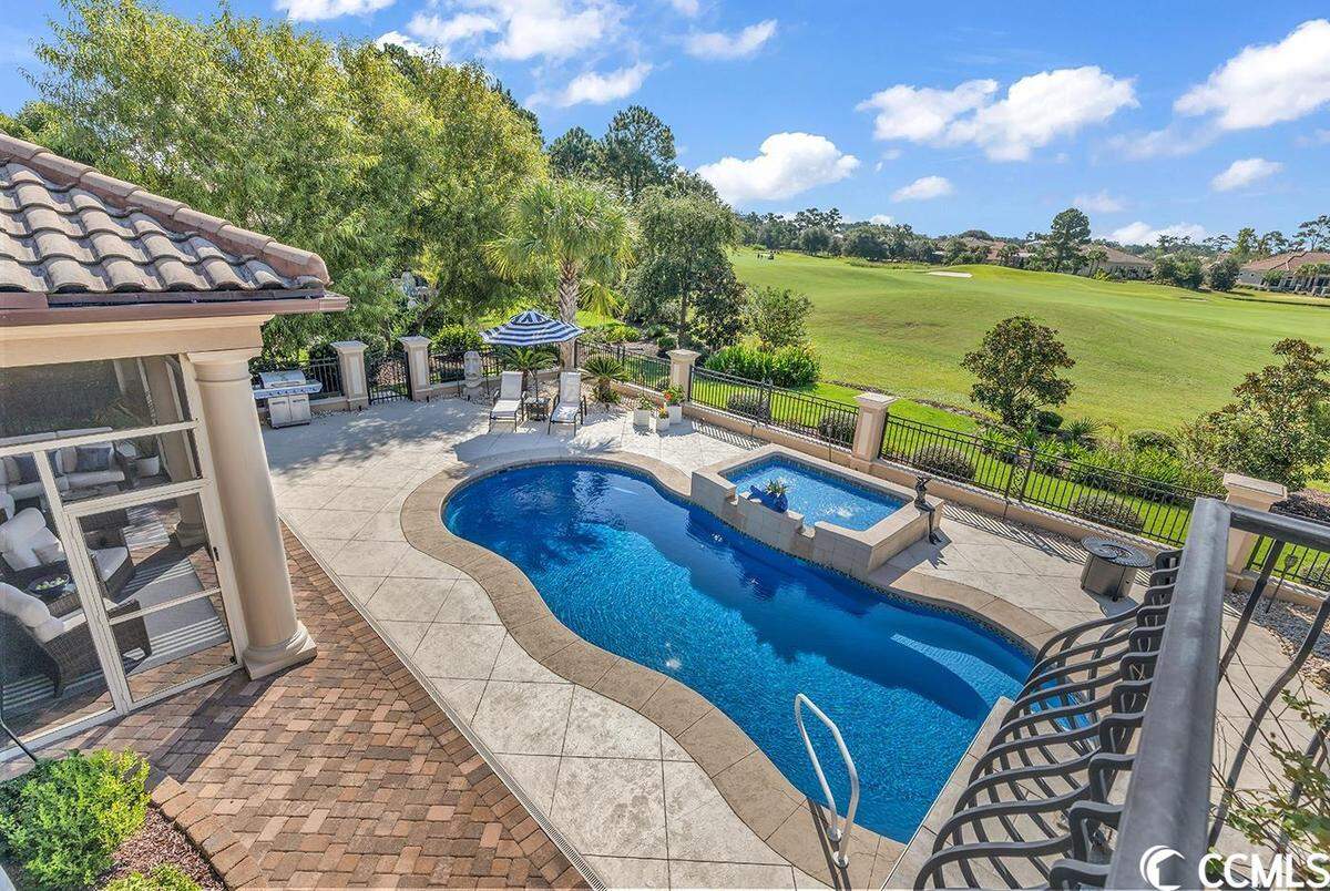A home overlooking the Myrtle Beach’s Grande Dunes Members Club golf course is listed for $1.5 million. It has four bedrooms and a pool. Provided photo. Sept. 17, 2023.