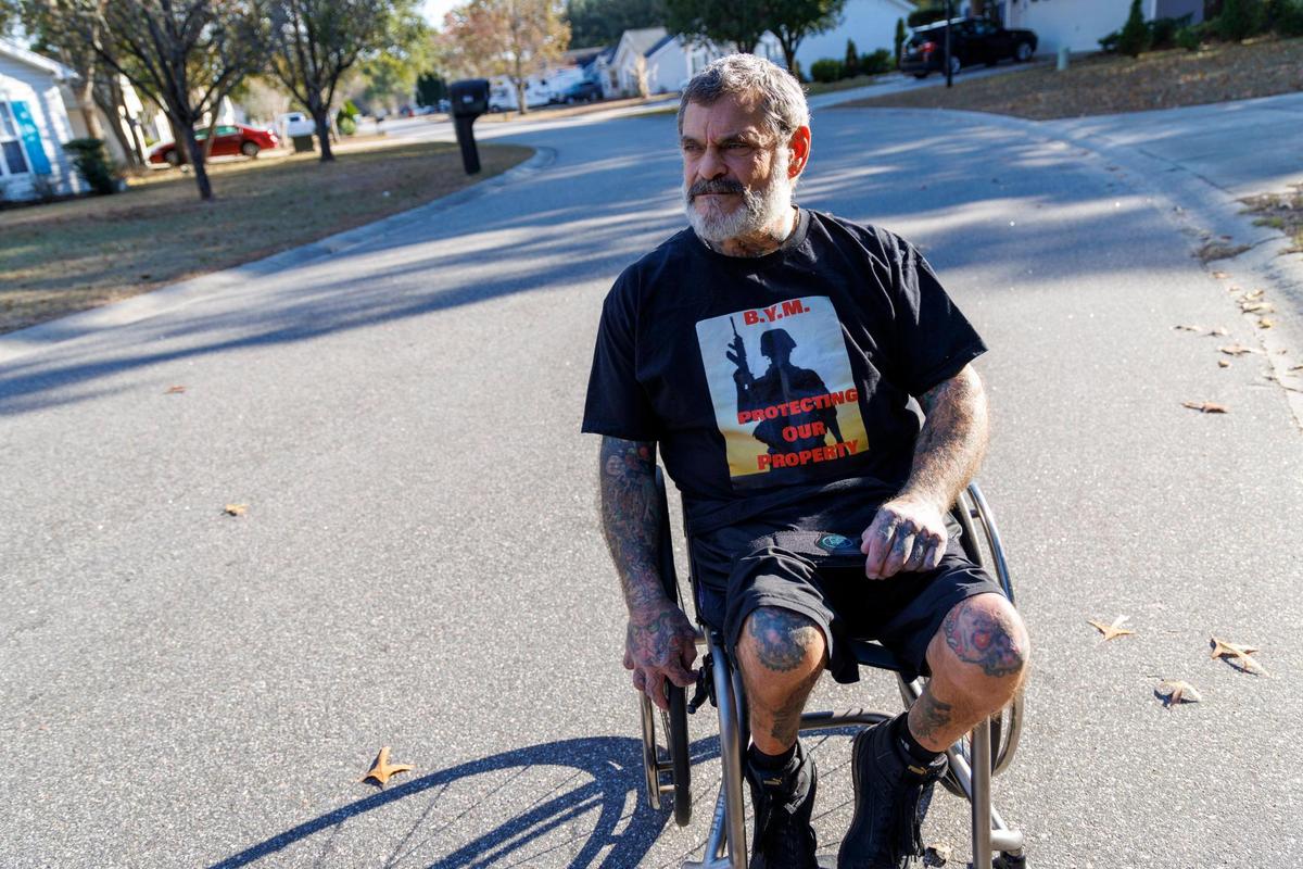 Doug Champa says that he rolled his wheelchair in front of a school bus to stop the vehicles from speeding through his neighborhood. He was arrested for on November 22 for interfering with school bus operations. Dec. 9, 2024.