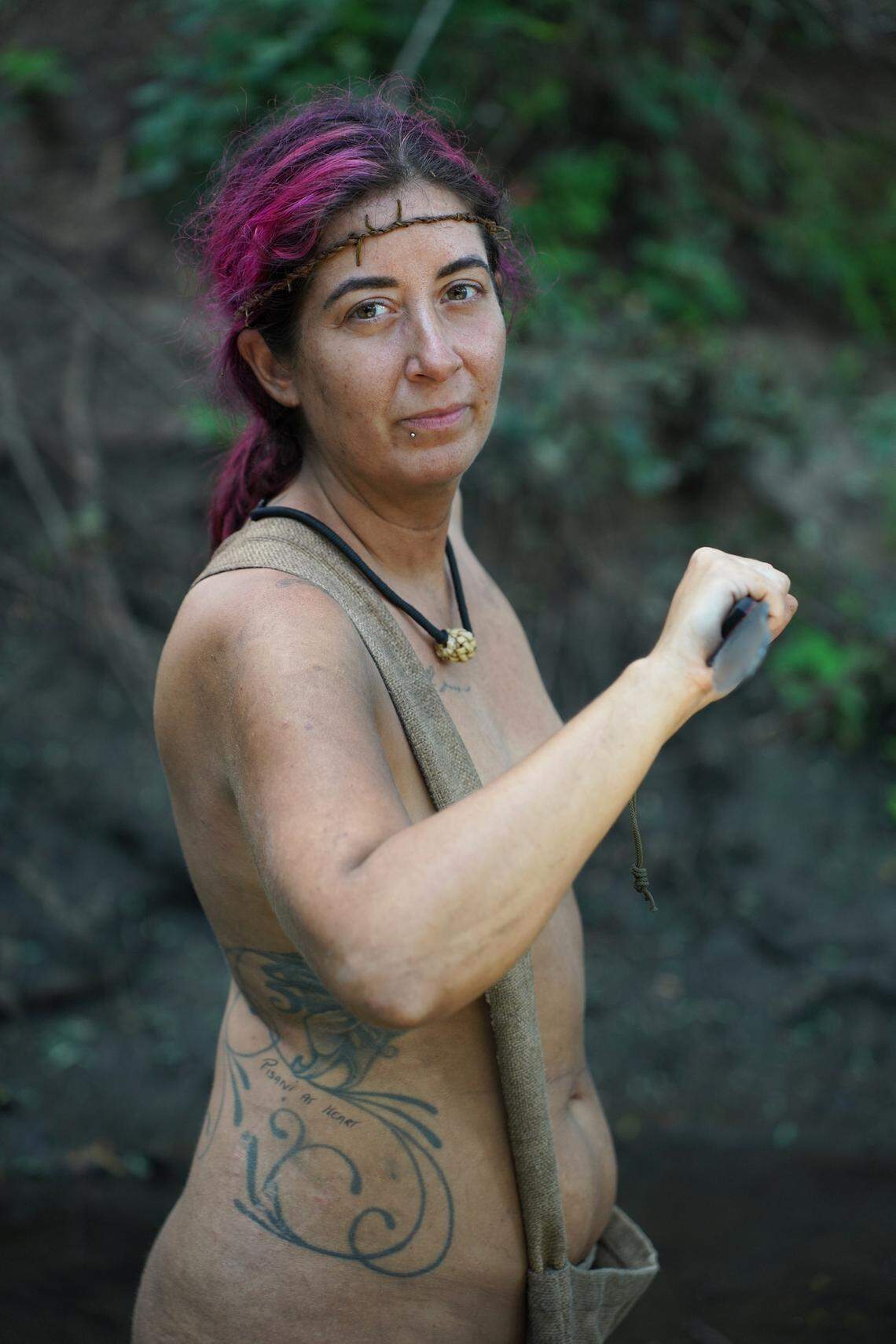 Nicole Pisani holds a knife that she used on the reality TV show “Naked and Afraid.” The Myrtle Beach woman spent more than two weeks in the African bush.