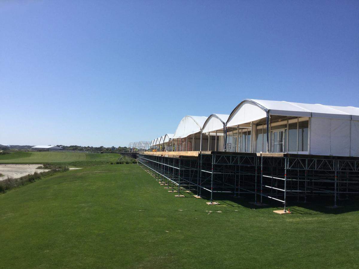 Corporate chalets are being constructed to the left of the 18th green and fairway at Kiawah Island Golf Resort’s Ocean Course ​on Monday. The 2021 PGA Championship will be played at the course from May 20-23. April 12, 2021.