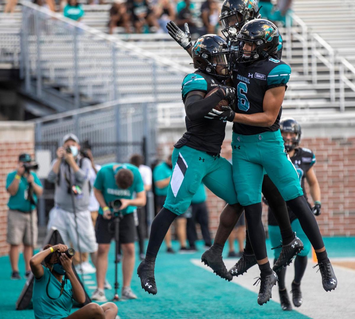 Coastal’s C.J. Marable celebrates a touchdown in the fourth quarter against Georgia Southern. Coastal Carolina played its first game as a ranked FBS team against Georgia Southern on Saturday at Brooks Stadium in Conway. October 24, 2020.