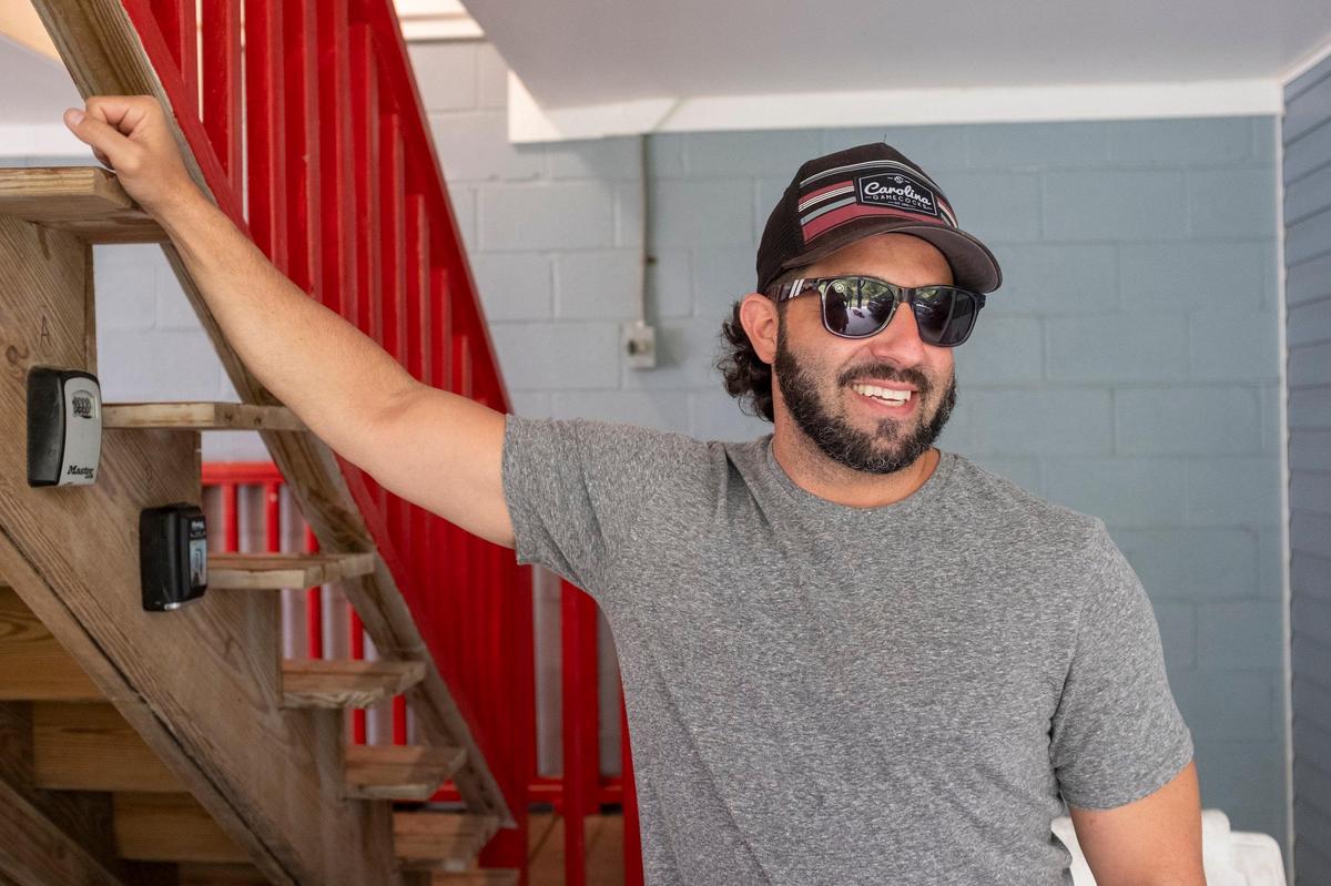 Ryan Trotti, of The Ryan Trotti Band, stops to visit the Whits End Band members before their first performance at Carolina Country Music Fest. Trotti is set to perform for the second year at Carolina Country Music Fest 2019.