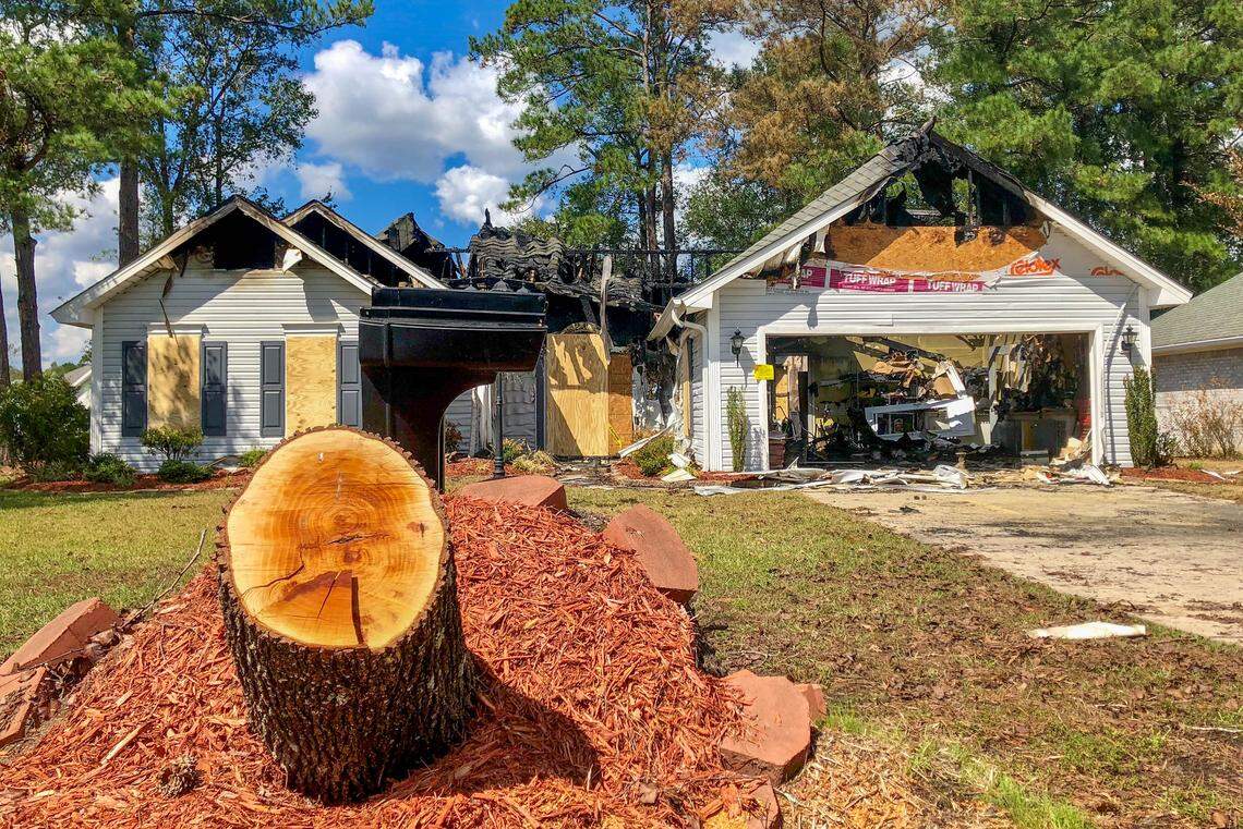 A home sits burned in Aberdeen Country Club in Longs Monday.