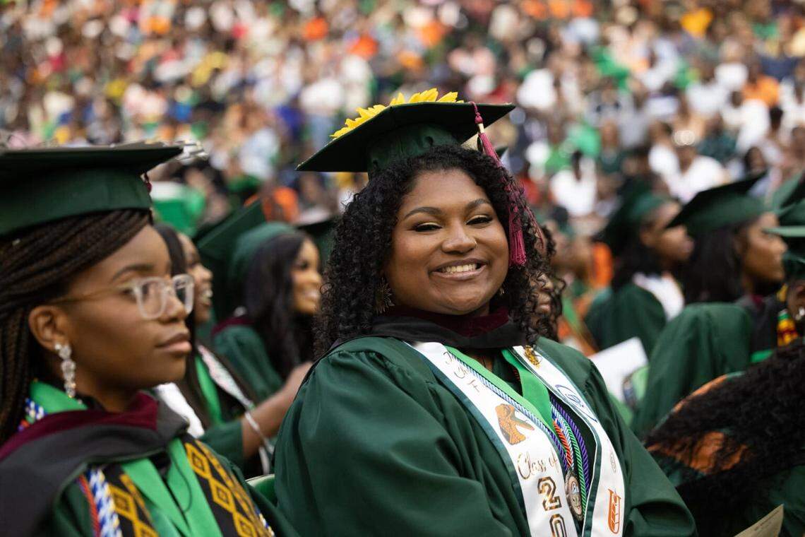 Jordan Forbes, a first-generation college graduate, poses for a picture during Florida A&M University’s spring 2024 commencement ceremony.