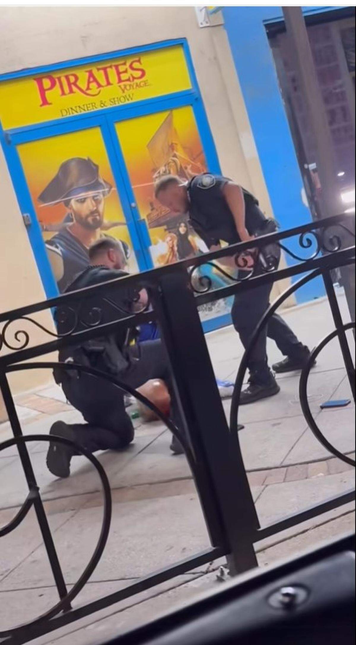 Screenshots taken from witness video on the night of April 26, 2025, in downtown Myrtle Beach, show officers after a deadly mass shooting along North Ocean Boulevard.
