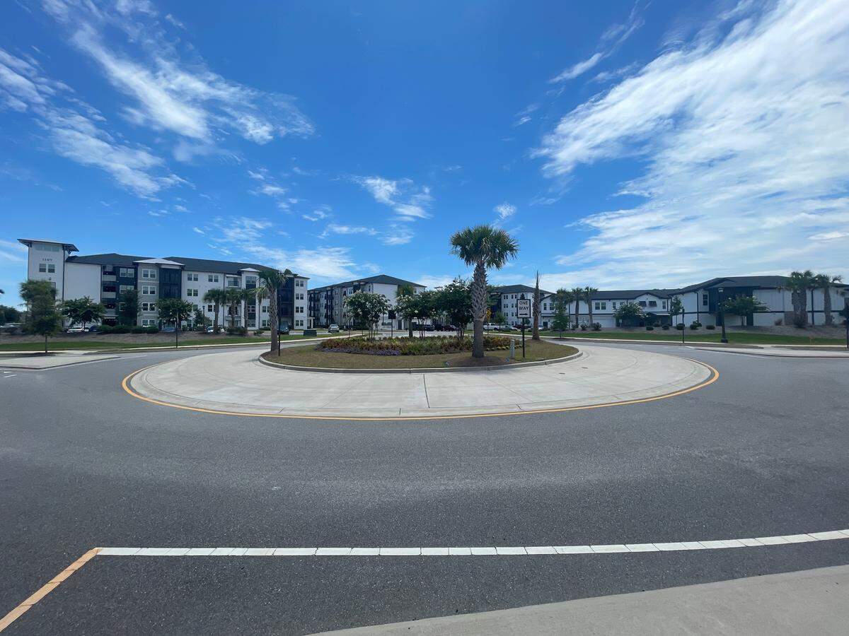 The Lively at Grande Dunes sits on land behind the proposed hotel location. The large apartment complex is part of ongoing development plans for the broader area.