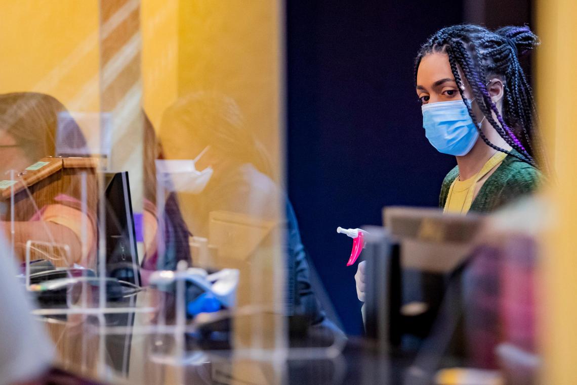 Captain’s Quarters front desk representatives check vacationers in Friday afternoon as Myrtle Beach hotels and short-term lodging rental businesses prepared to reopen after county and municipal governments lifted restrictions on reservations forced by the coronavirus outbreak.C