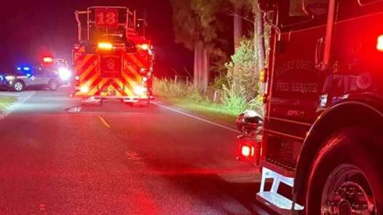 Person, building hit by driver backing out of Horry County driveway. Pedestrian dies