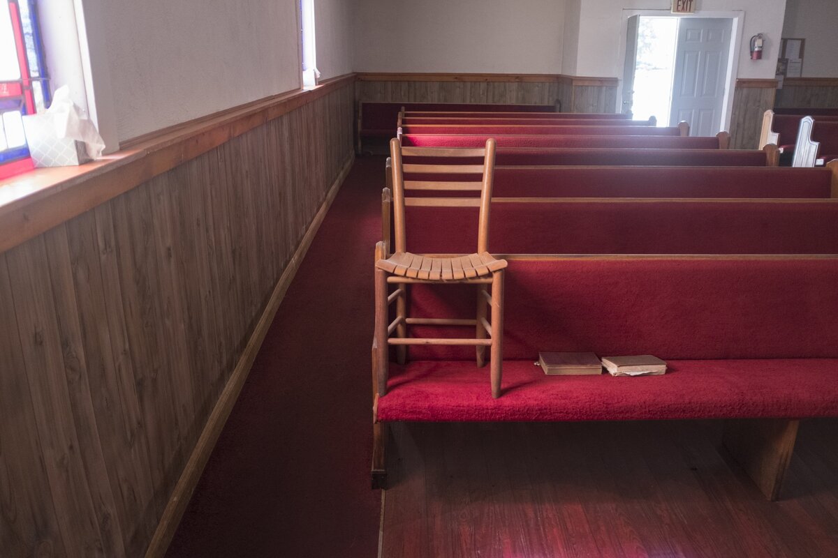 A chair was placed on the pew of Victoria Chapel Holiness Church in Bucksport, S.C. Flooding did enter the sanctuary and community rooms of the church following Hurricane Florence. Wednesday. October 3, 2018.
