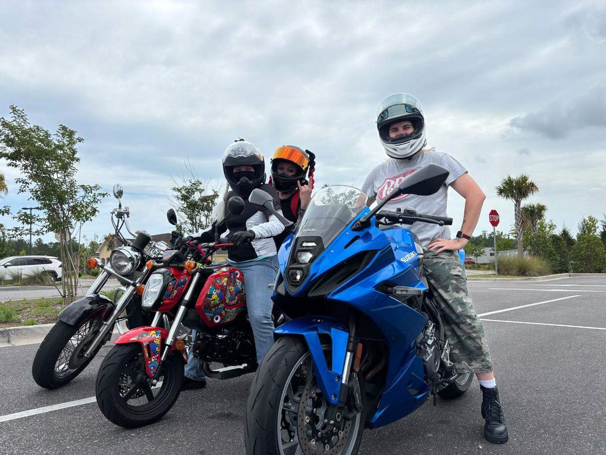 Aliyanna Lovett, Raven Bunton and Laurie Hickey pose on their motorcycles in Myrtle Beach. Lovett organizes women-only rides in the Myrtle Beach area.