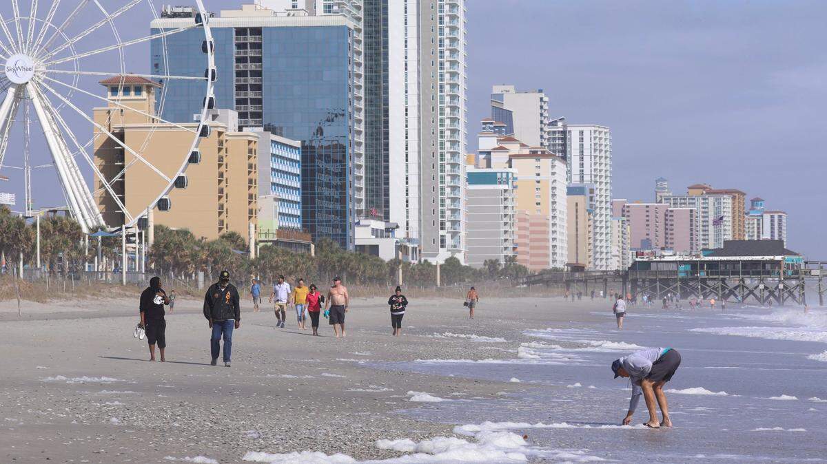 People enjoyed a beautiful warm and sunny Fall day along the Myrtle Beach area coast despite the predictions of dangerous conditions due to Hurricane Nicole. Though the storm battered Florida on Thursday and forecasters predicted coastal flooding and tornados for the Carolina’s, Myrtle Beach was largely spared the impacts of the sub-tropical system. November 11, 2022.