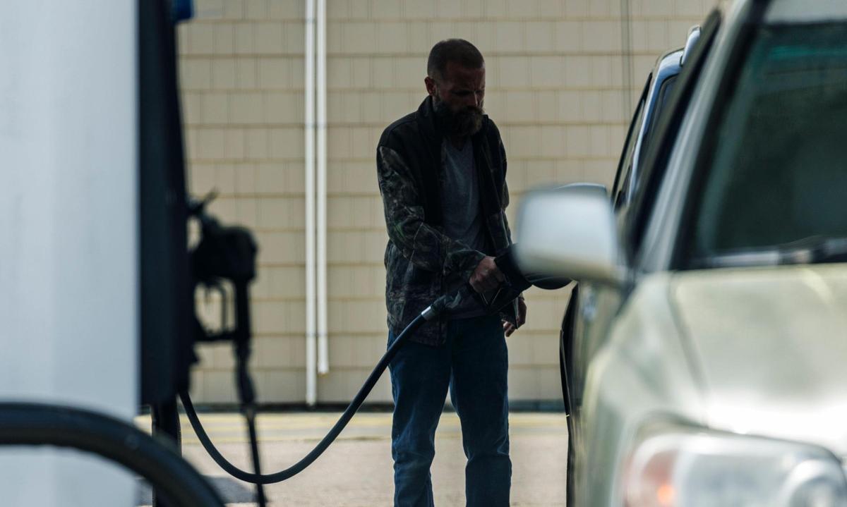 Customers fill their cars with fuel at gas stations just over the North Carolina line on Monday, March 24, 2025.