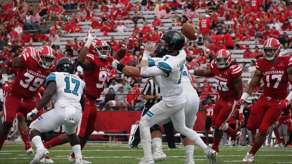 Coastal Carolina senior quarterback Kilton Anderson throws a pass against Louisiana on on Sept. 22 at the Cajundome in Lafayette, La. Anderson missed two games after injuring his left ankle in the third quarter of that game but returned to the starting lineup last week at UMass.