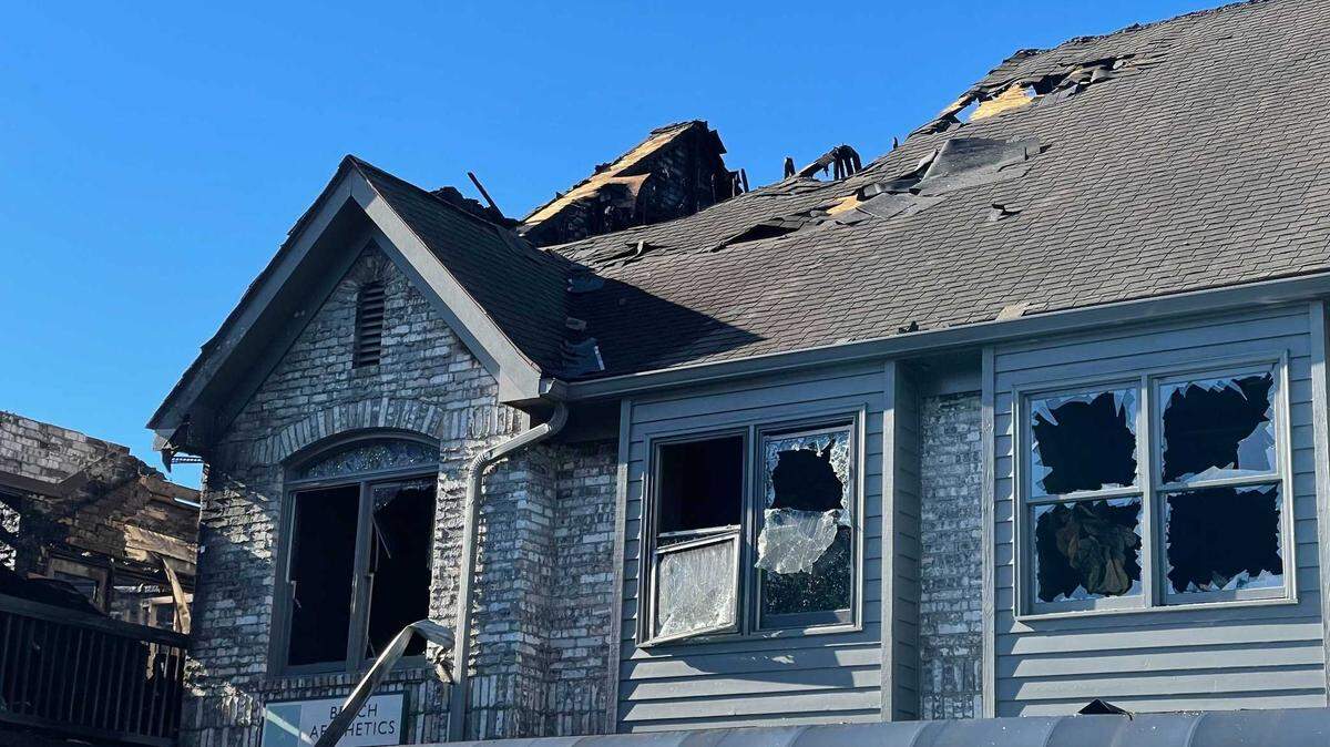 Firefighters from Myrtle Beach and Horry County responded Tuesday night to 48th Avenue North and Robert Grissom Parkway for a three-alarm fire at a row of businesses.