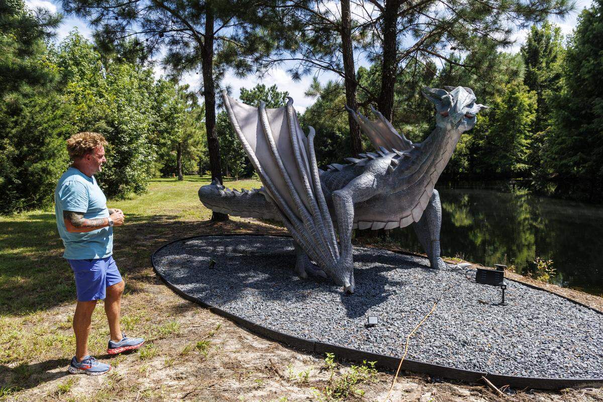 Alan Jones has acquired an eclectic mix of custom cars, marvel superheroes and movie and T.V. memorabilia at his Grande Dunes home in Myrtle Beach, SC. He and his wife Lisa also have a Loris farm that houses an animatronic dragon, a giant octopus and several dinosaurs replicas. “I just want people to enjoy it with me,” he said. August, 2025.