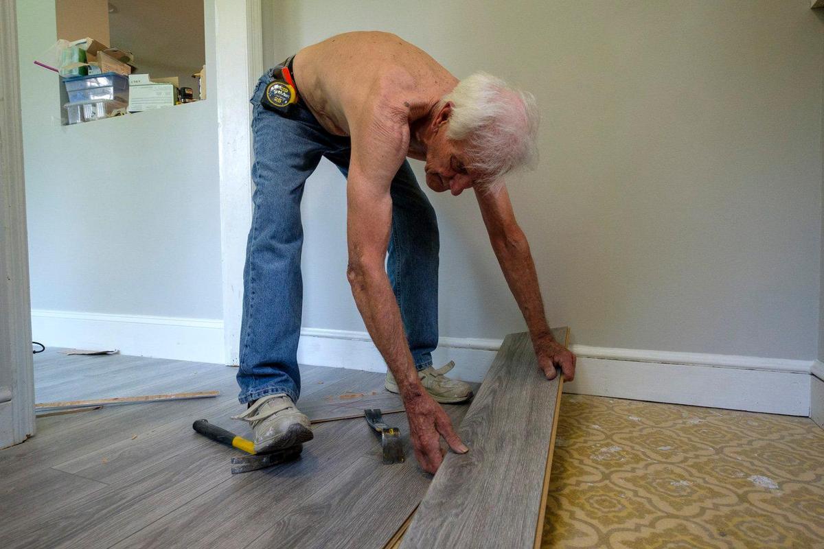 Bob Gorski, the new owner of the house previously owned by Lucille Waine on Liberty Street in Loris, replaces flooring during a remodeling job on the home. Lucille Waine, born in 1932, died in a car accident in February, 2020. “Miss Lucille,” as she was called in the Loris community, was well known for caring for her neighbors. As her house was remodeled by new owners, the community rememembers Lucille Waine. June 11, 2021.