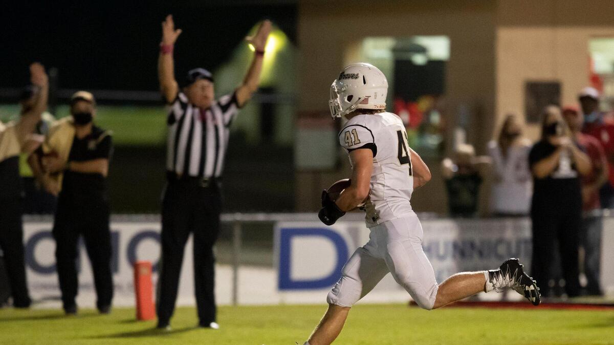 Socastee running back Luke Board (41) scores a TD late in the 2nd quarter against Conway Friday at Conway High School.