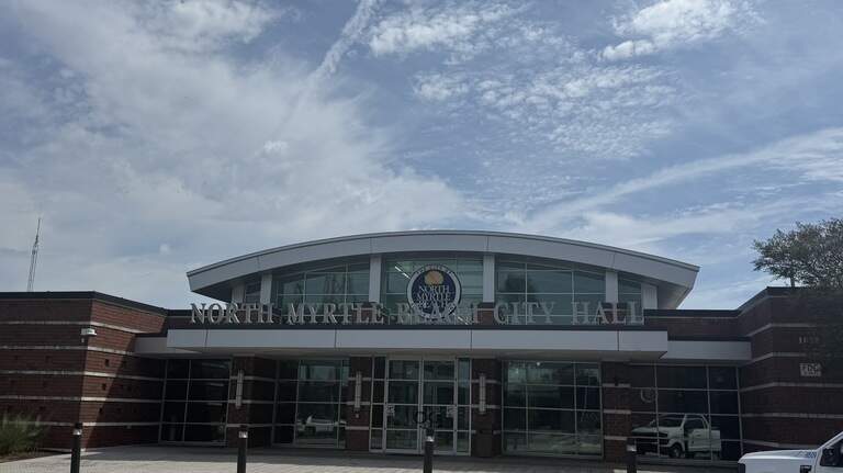 Did North Myrtle Beach mayor violate income disclosure law by hiding city contracts?