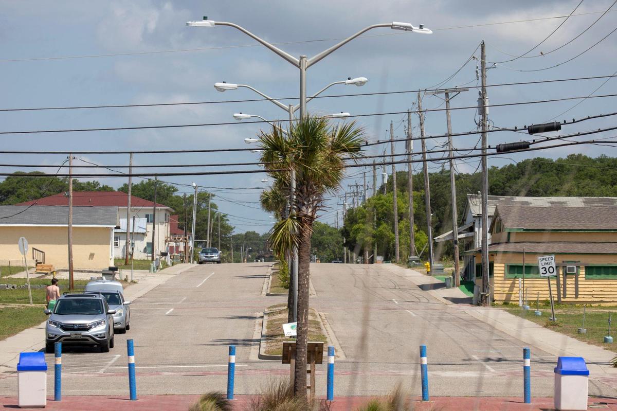 The streets of Atlantic Beach are almost deserted following in the weeks following the Atlantic Beach Bike Festival. The small historically black beach town sandwiched between sections of North Myrtle Beach, is undergoing a revitalization according to town manager Benjamin Quattlebaum. New homes are being constructed and oceanfront lots are being marketed to hotels and resorts. June 13, 2022.