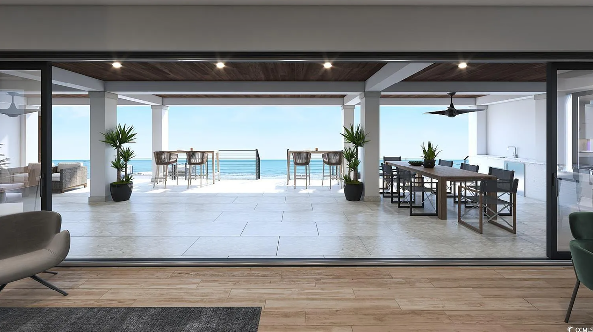 The home at 4304 North Ocean Boulevard sits right by the beach, with oceanfront views from its three floors.
