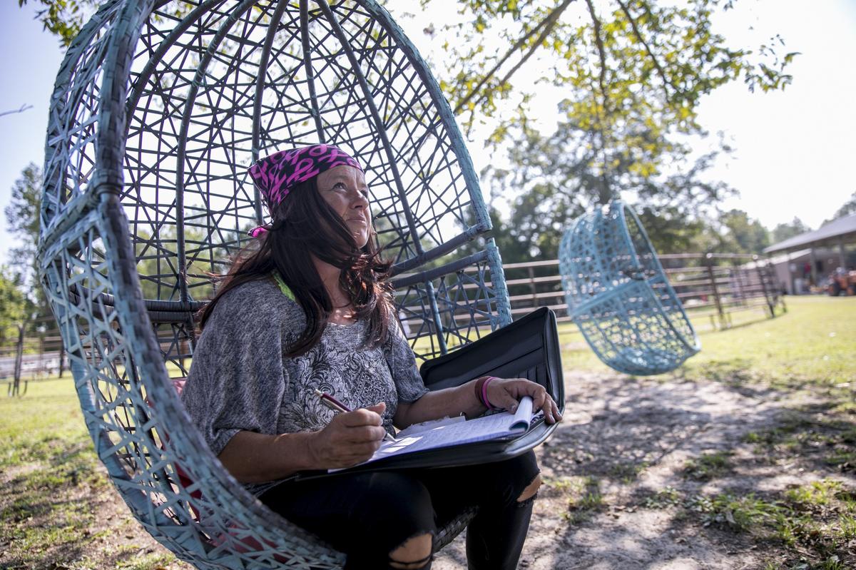 Leah Collins, 30-days sober, writes out a “gratitude list” as part of her therapy at the ‘Recovery Ranch’.  Aug 24, 2018.