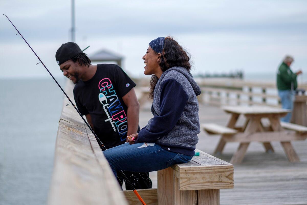 Jamaal Pankey and Kiama Crawford of Laurenburg, S.C. say they found peace on Monday fishing from the Third Avenue Pier in Myrtle Beach. Locals and visitors are finding outdoor activities to help cope with the stress of the coronavirus. March 23, 2020.