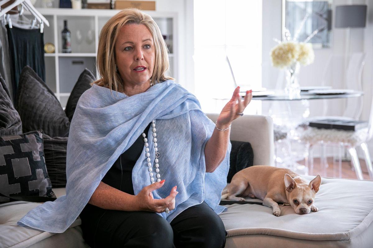 Tara Grinna, a Myrtle Beach swimsuit designer and manufacturer, accompanied by her dog Harold Jingles, talks about building her company over the last thirty years from her offices above her Barefoot Landing store.
