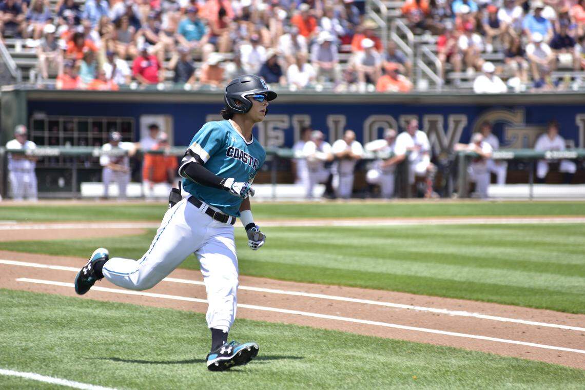 Coastal Carolina centerfielder Parker Chavers watches his home run clear the fence Friday in the fourth inning of CCU’s NCAA Atlanta Regional opener against Auburn at Russ Chandler Stadium in Atlanta.