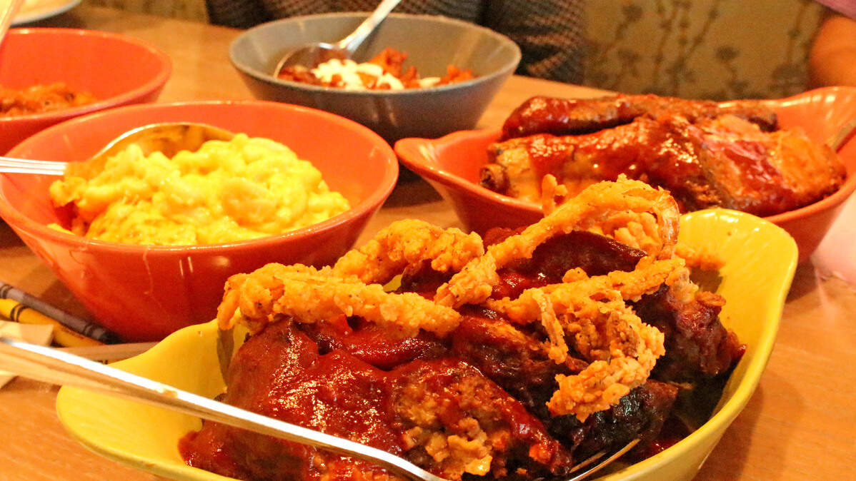 Meatloaf, ribs and macaroni and cheese at Paula Deen’s Family Kitchen.