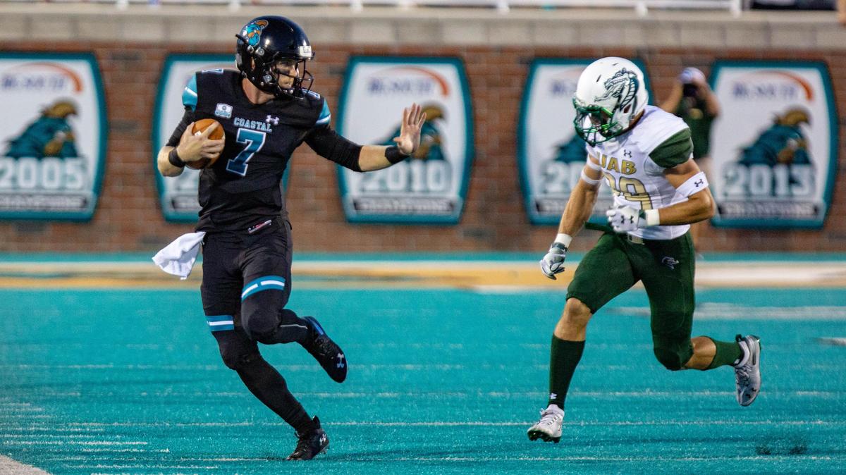 Coastal Carolina senior quarterback Kilton Anderson scrambles for yardage against UAB on Saturday night during CCU’s 47-24 win at Brooks Stadium. The Chanticleers have moved their game against Campbell from this upcoming Saturday to Wednesday, and the game is being moved from Brooks Stadium to Campbell’s stadium in Buies Creek, N.C.