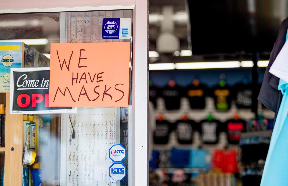 Bargain World on Main Street in North Myrtle Beach advertises respirator masks for sale Monday afternoon as Horry County continues to deal with the spread of the COVID-19 coronavirus.