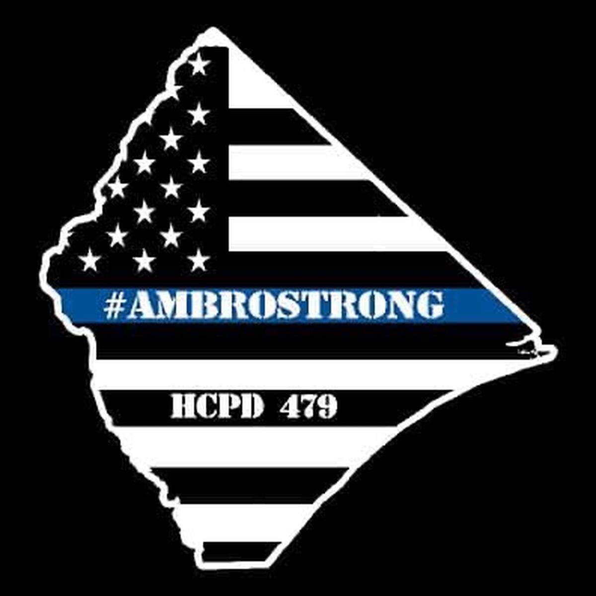 A memorial logo for Cpl. Michael Ambrosino.