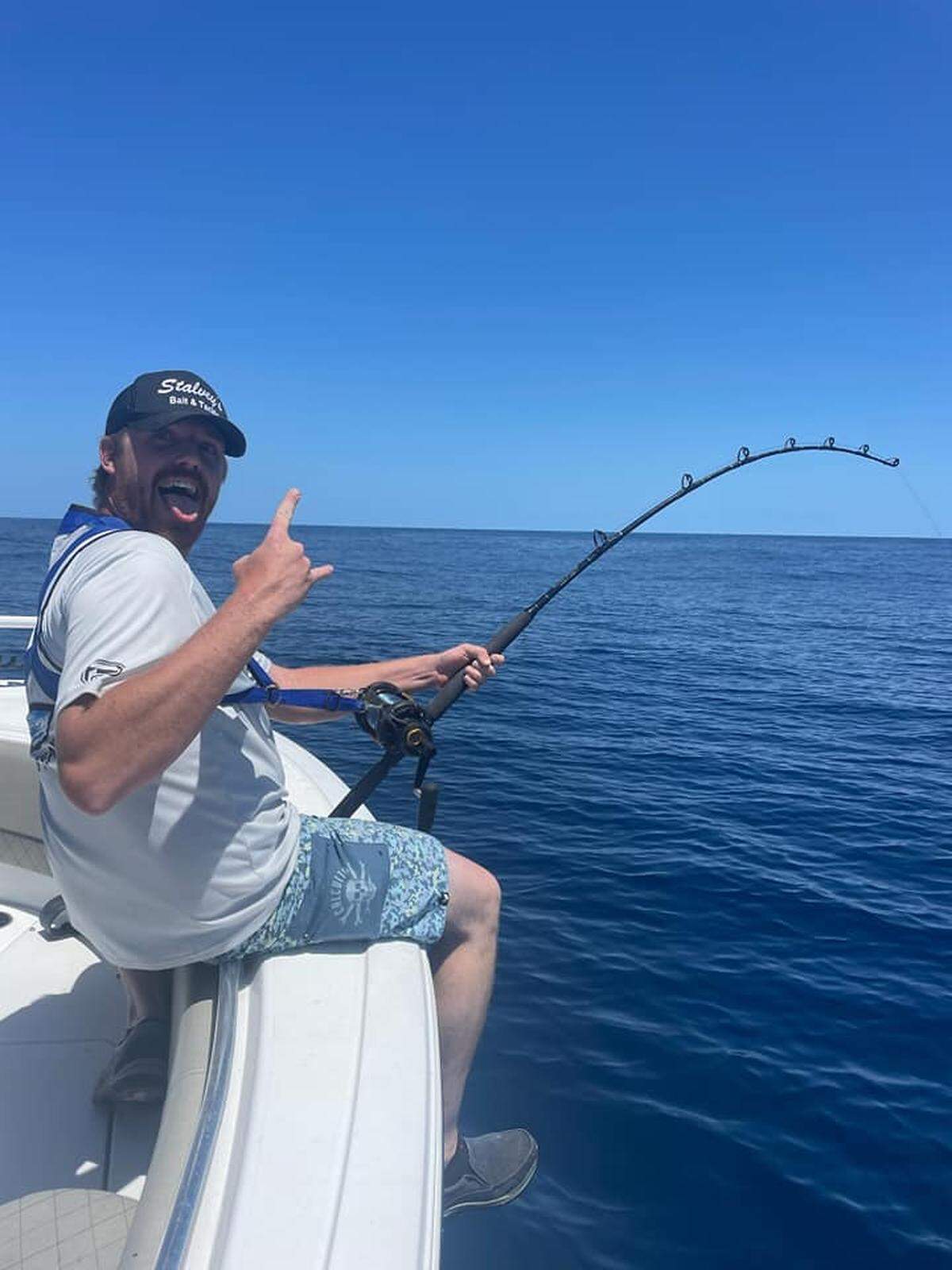 Ronald ‘Catfish’ Stalvey sits near the bow of his 232 Sportsman Open while fighting a sizeable blue marlin 80 miles offshore of Georgetown on April 24.