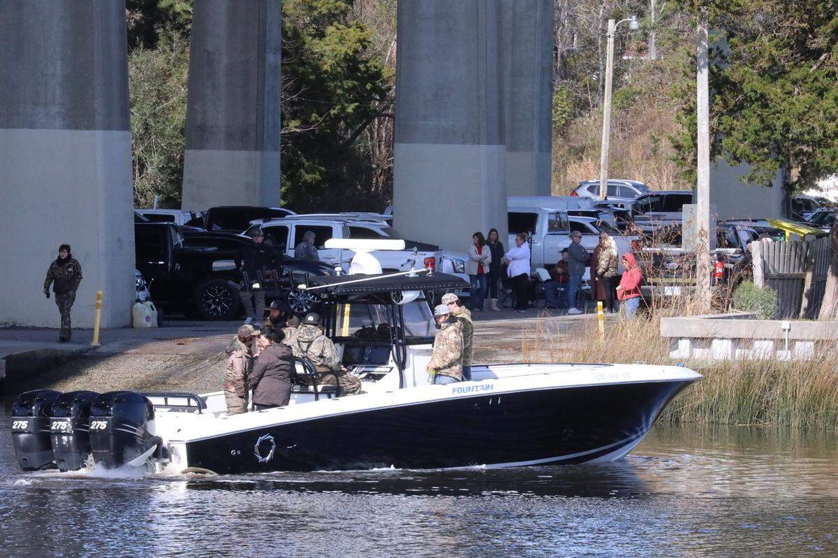 A rescue boat searches near Little River, S.C., Friday on the Intracoastal Waterway looking for missing boater Tyler Doyle. Jan. 27, 2023.