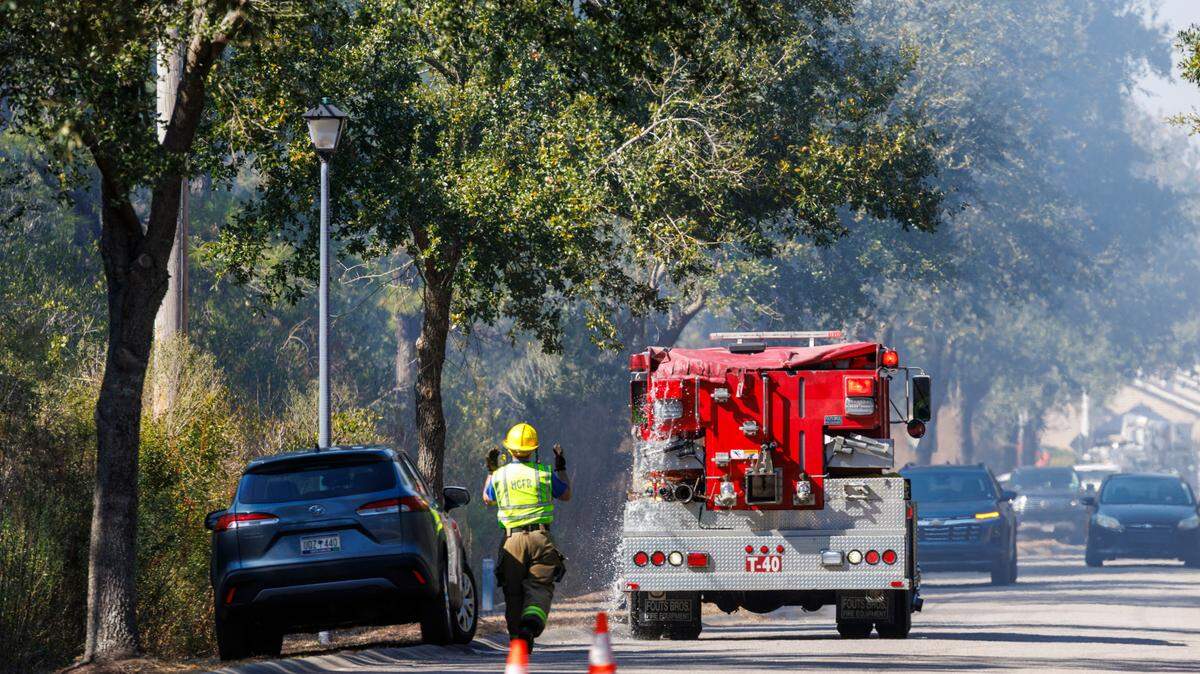 The Carolina Forest fire had burned more than 1600 acres by day three on Monday and was 30 percent contained. Firefighters from around the region dug fire breaks around communities and responded to hot spots while aircraft dropped water on the flames. Monday, March 3, 2025.