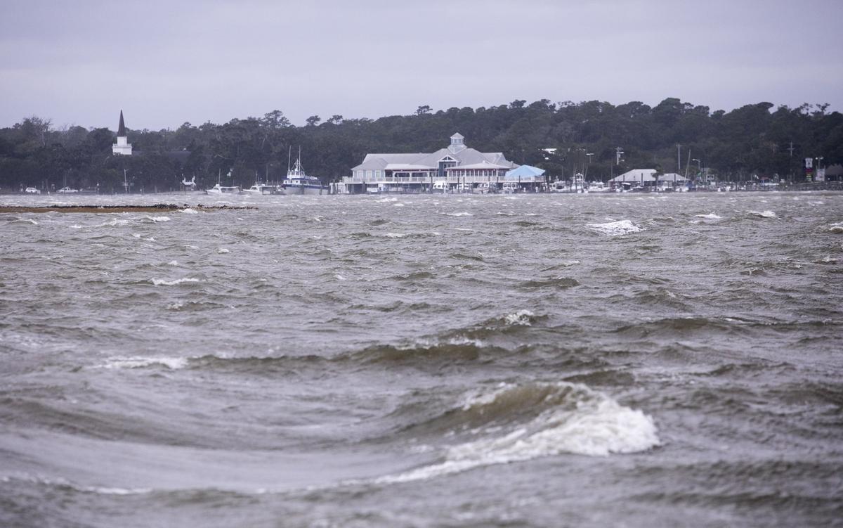 Waves wash through a usually calm Murrells Inlet during the high tide on Thursday. The remnants of Hurricane Michael passed through the Grand Strand bringing high winds, and coastal flooding. Oct. 11, 2018