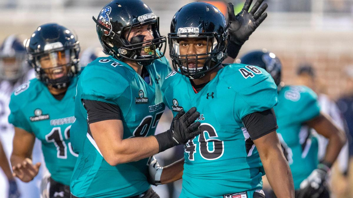 Coastal Carolina freshman tight end Isaiah Likely celebrates after catching a touchdown pass from freshman Fred Payton against the Georgia Southern Eagles on Nov. 17, 2018 at Brooks Stadium in Conway.