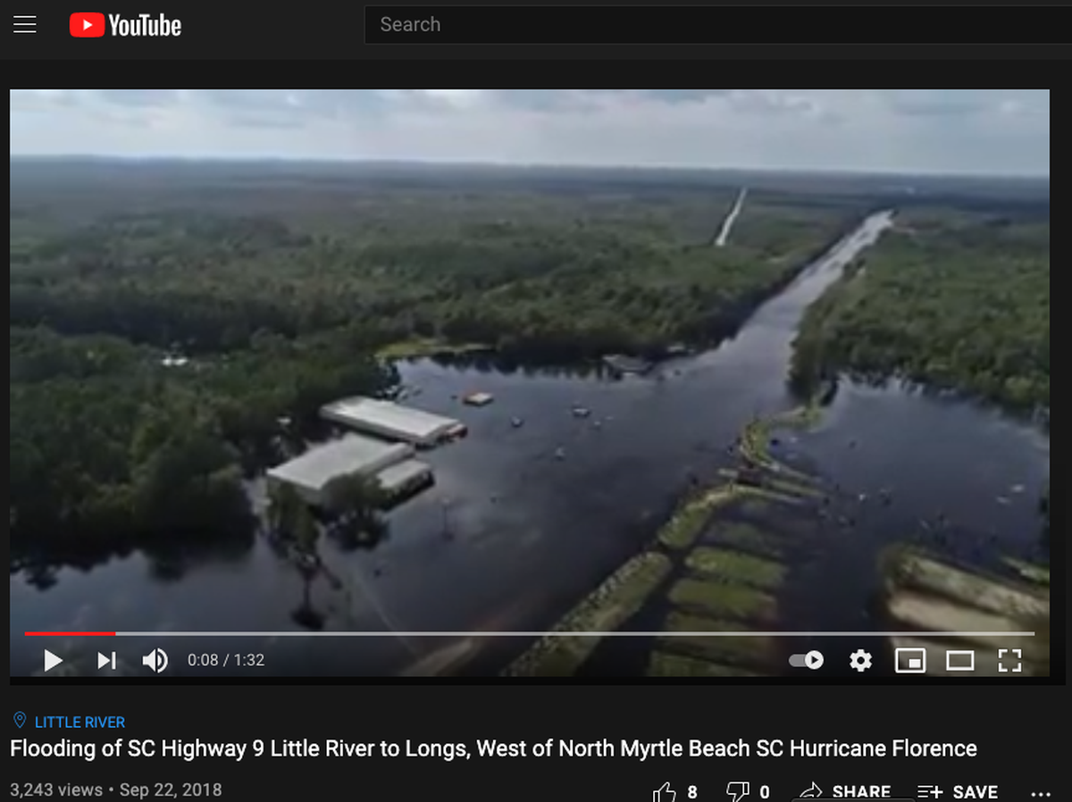 A screenshot from a 2018 YouTube video shows high floodwaters during Hurricane Florence along Highway 9 and in the River Haven neighborhood that’s since begun selling new homes.