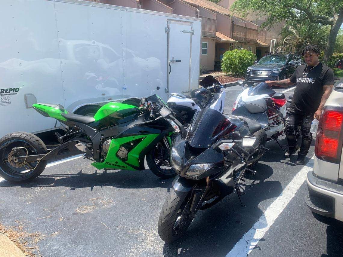 Frank Tillery stands beside his bike and few of his friends’ bikes before leaving the Airbnb. Atlantic Beach Bikefest returned Memorial Day weekend after it was canceled two years in a row due to COVID-19 concerns. May 28, 2022.