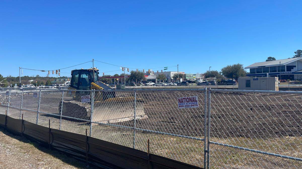 Construction crews work on a site in the Carolina Forest at the Marketplace at the Mill shopping area. Horry County Land Records indicate a new bank will open there.